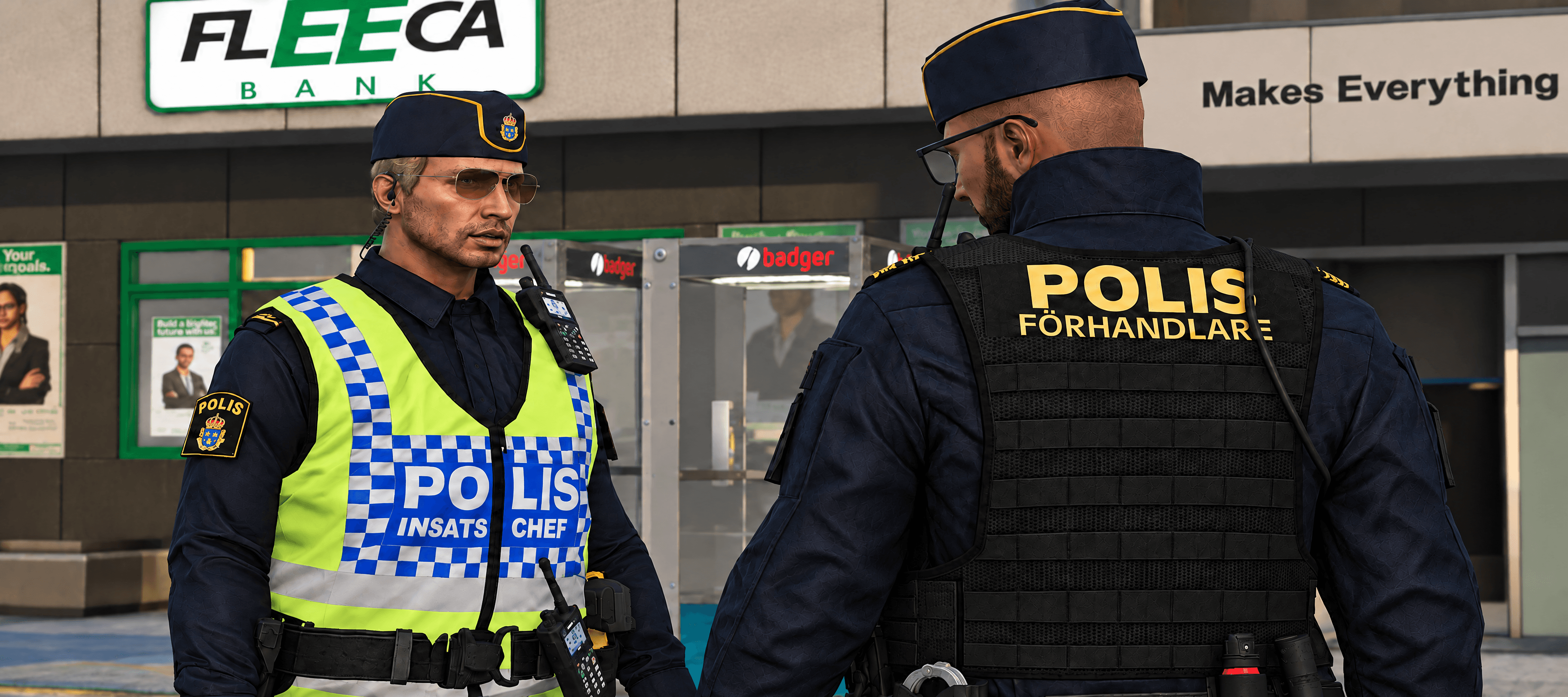 Två poliskollegor i uniform utanför en bank.